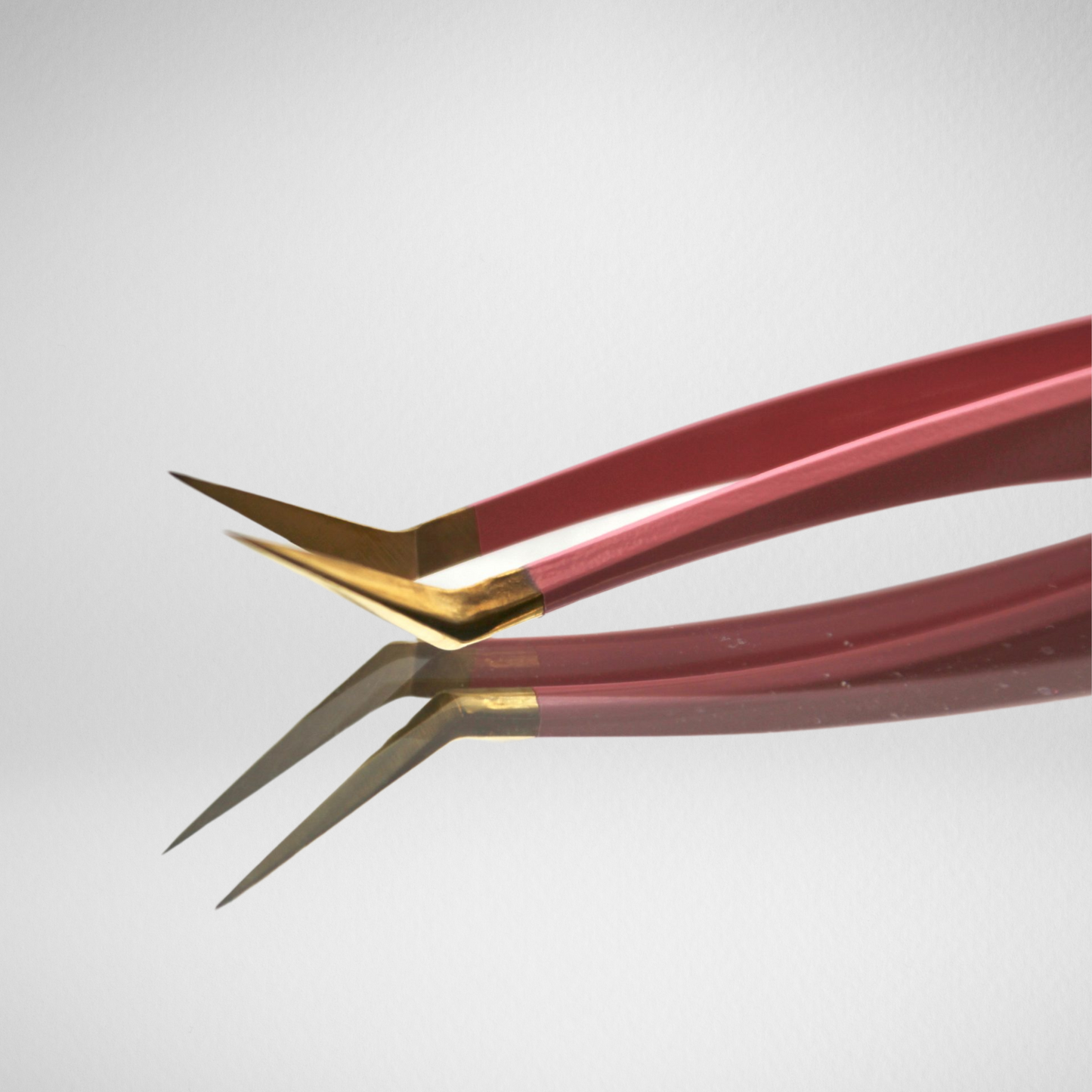 Pink isolate tweezer