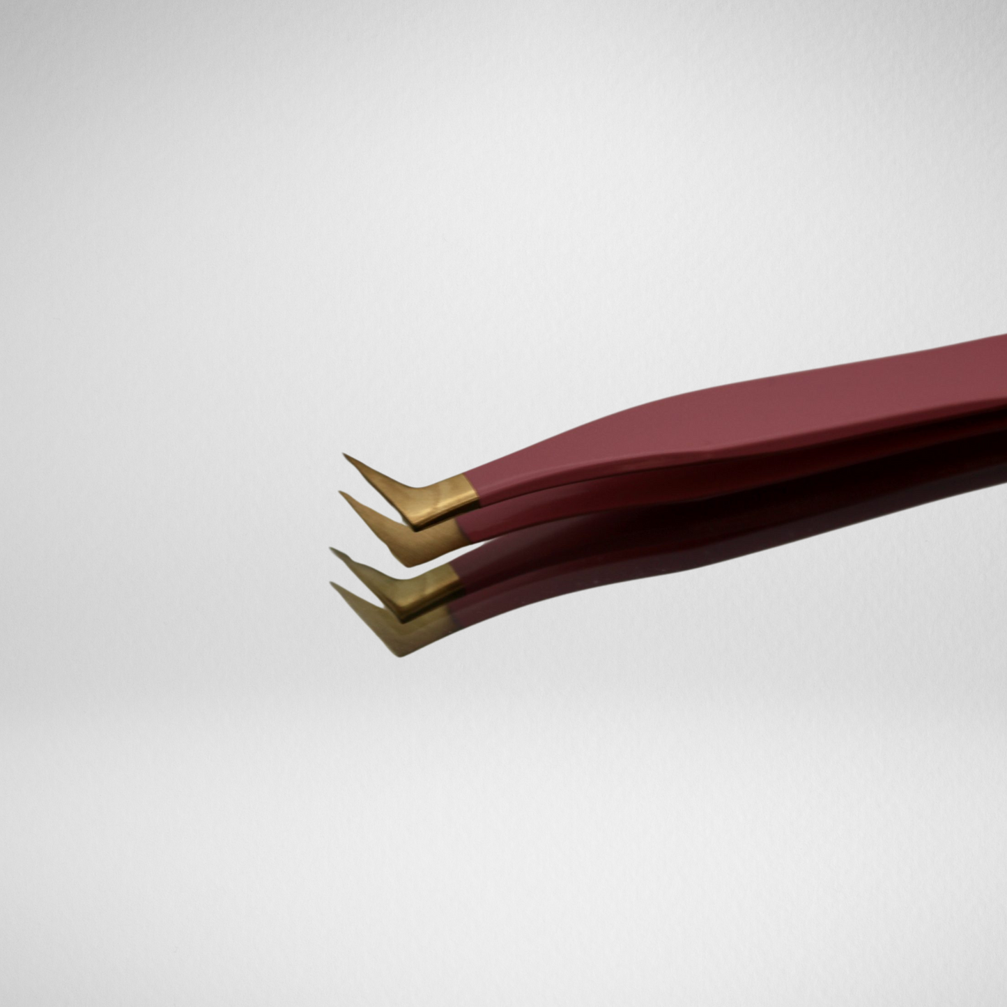 Pink applicate tweezer