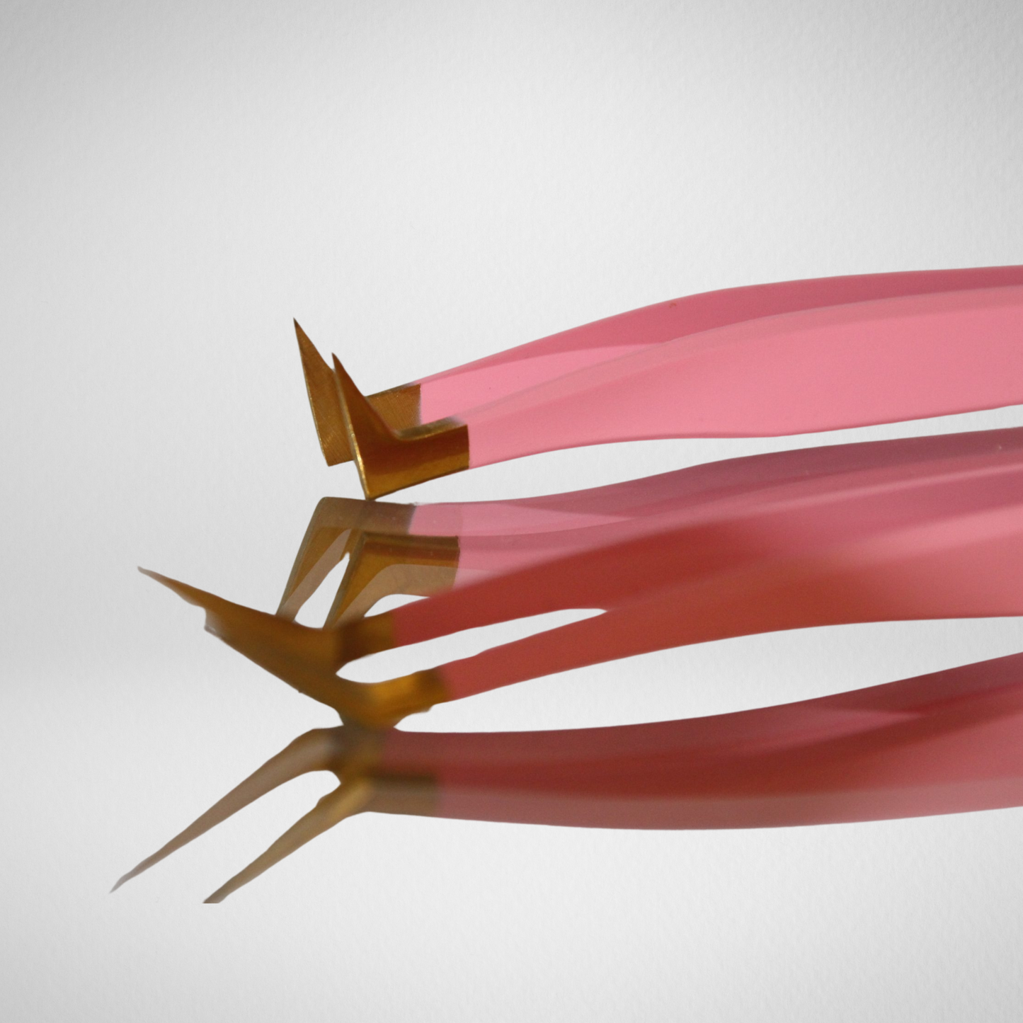Pink isolate tweezer